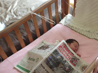 Image of the day: Irish baby enjoying a good read